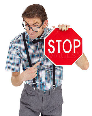 Buy stock photo Portrait, stop sign and a man nerd pointing in studio isolated on a white background to direct traffic. Safety, law or legal with a young geek in glasses showing a road warning for speed danger