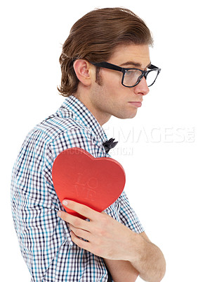 Buy stock photo Love, sad and profile of man with heart emoji, romance and valentines day isolated on white background. Waiting, depressed geek and valentine shape chocolate box with glasses and bow tie in studio.