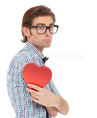 Buy stock photo Love, depression and portrait of man with heart emoji, romance and valentines day isolated on white background. Waiting, sad geek and valentine shape chocolate box with glasses and bow tie in studio.