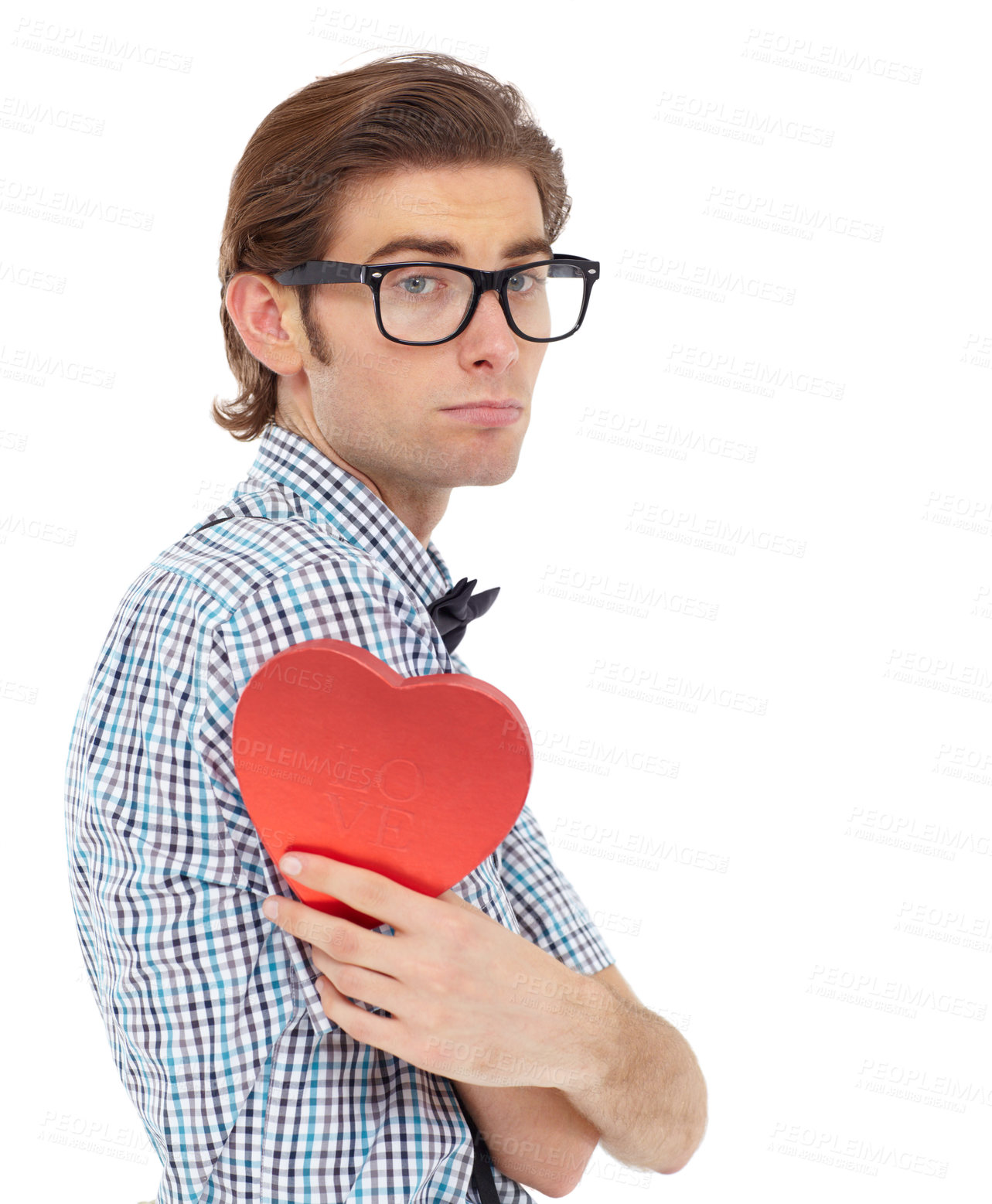 Buy stock photo Love, depression and portrait of man with heart emoji, romance and valentines day isolated on white background. Waiting, sad geek and valentine shape chocolate box with glasses and bow tie in studio.