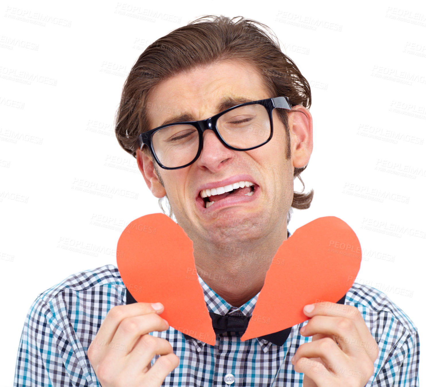 Buy stock photo Heartbreak, sad and crying with a man in studio isolated on a white background on valentines day. Heart broken, tear and lonely with a male nerd on black space feeling emotional regret or sorrow