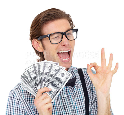 Buy stock photo Ok sign, wink and man with dollars or money in studio isolated on a white background. Winner, okay hand and person with cash after lottery, competition or bonus prize, cashback and financial freedom.