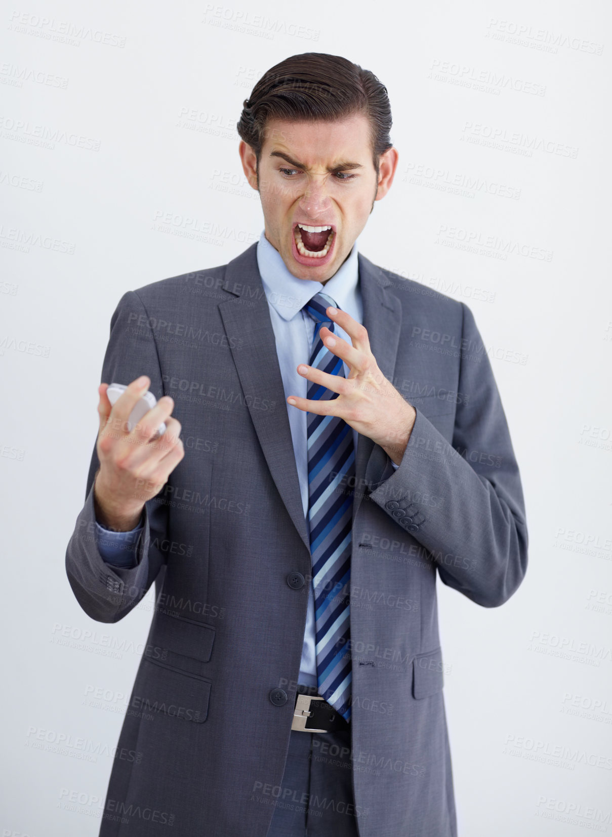 Buy stock photo Fail, phone call and business man angry, annoyed and screaming in studio on white background. Stress, anger and male person annoyed with phishing, delay and conversation with bad connection problem