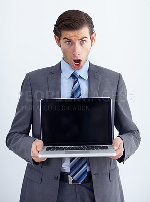 Buy stock photo Laptop, mockup and shock with portrait of man in studio for website, email and administration. Wow, news and technology with male employee in white background for corporate, internet or networking