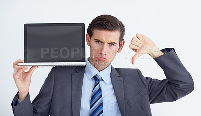 Buy stock photo Fail, thumbs down and laptop by business man portrait in studio unhappy, bad and disappointed on white background. Face, frown and negative review emoji by male person with online feedback or vote