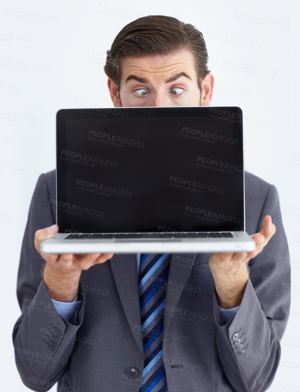Buy stock photo Laptop screen, mockup and deal with business man in studio for website, email or administration. Silly, news and technology with employee on white background for corporate, internet and networking