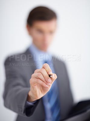 Buy stock photo Hand, writing and pen with a business man closeup in studio for planning, strategy or brainstorming an idea. Presentation, schedule or vision board with a corporate employee working on glass