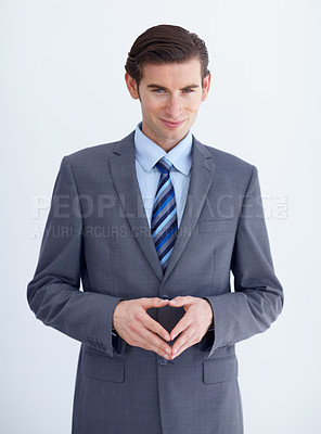 Buy stock photo Portrait, smile and a young business man in studio on a white background for planning or brainstorming. Corporate, professional and suit with a happy employee looking confident as a mastermind