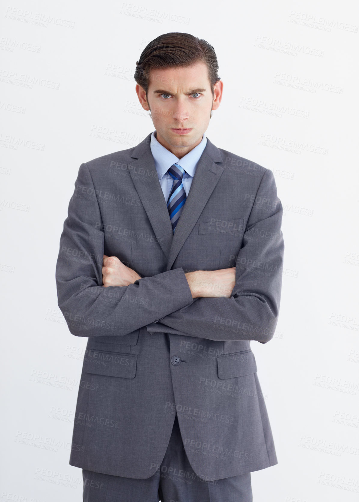 Buy stock photo Anger, crossed arms and portrait of business man on white background with upset, mad and angry expression. Employee, professional and face of male worker with stress, frustrated and annoyed in studio