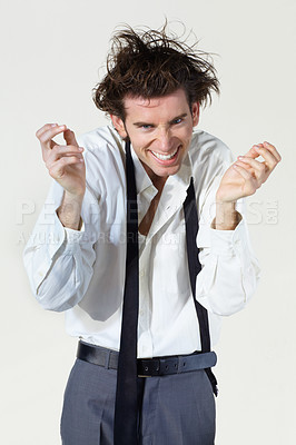 Buy stock photo Crazy, insane and portrait of business man on white background with stress, frustrated and mania. Mental health, depression and face of male worker with burnout, stressed out and messy hair in studio