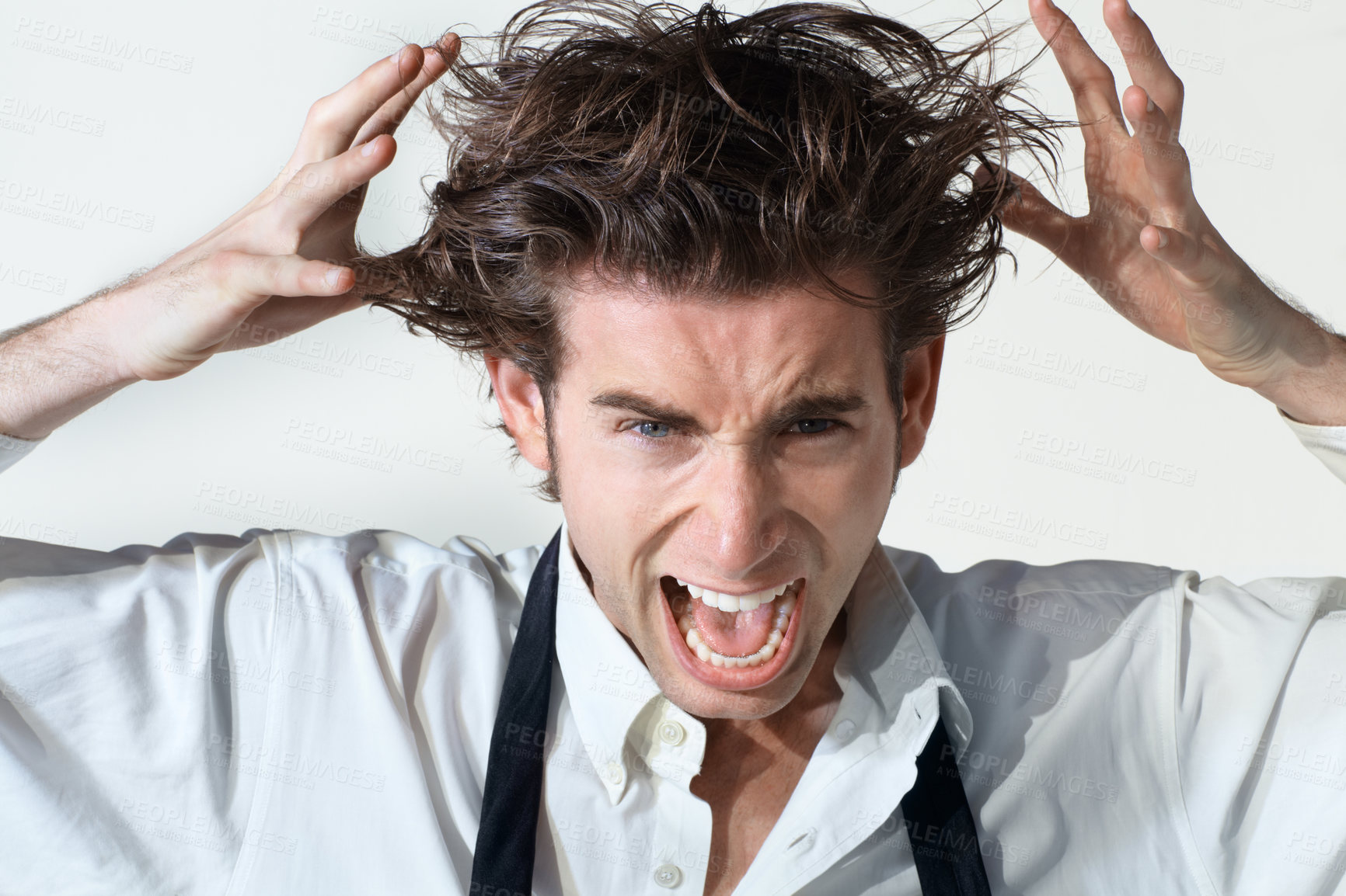 Buy stock photo Crazy, scream and portrait of business man on white background with stress, frustrated and anger. Mental health, depression and face of male worker shouting, stressed out and messy hair in studio