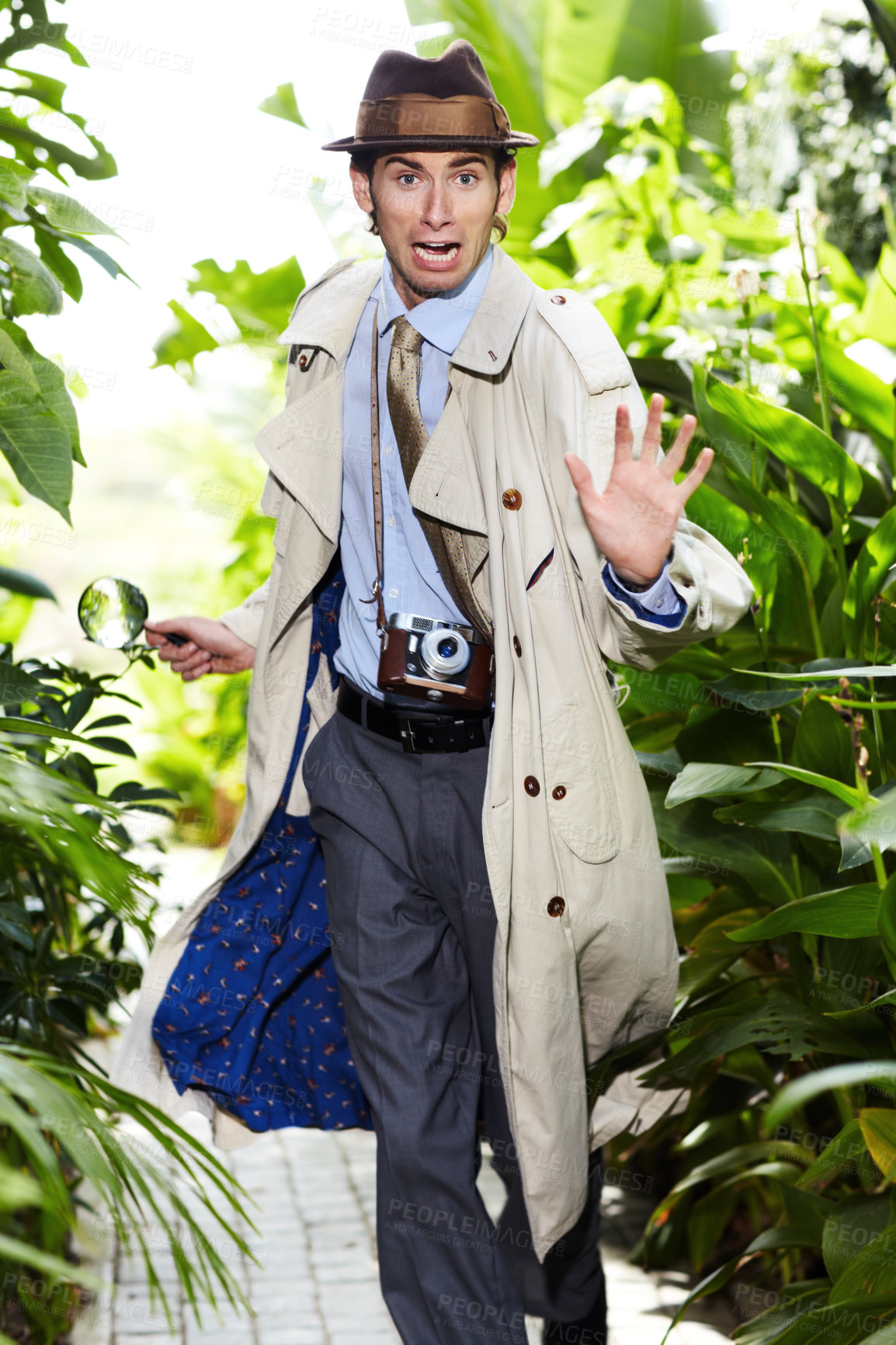 Buy stock photo Detective man, shocked search and portrait in jungle with vintage gear for investigation and solution. Outdoor, private investigator and spy with comedy for surveillance and retro reporter character