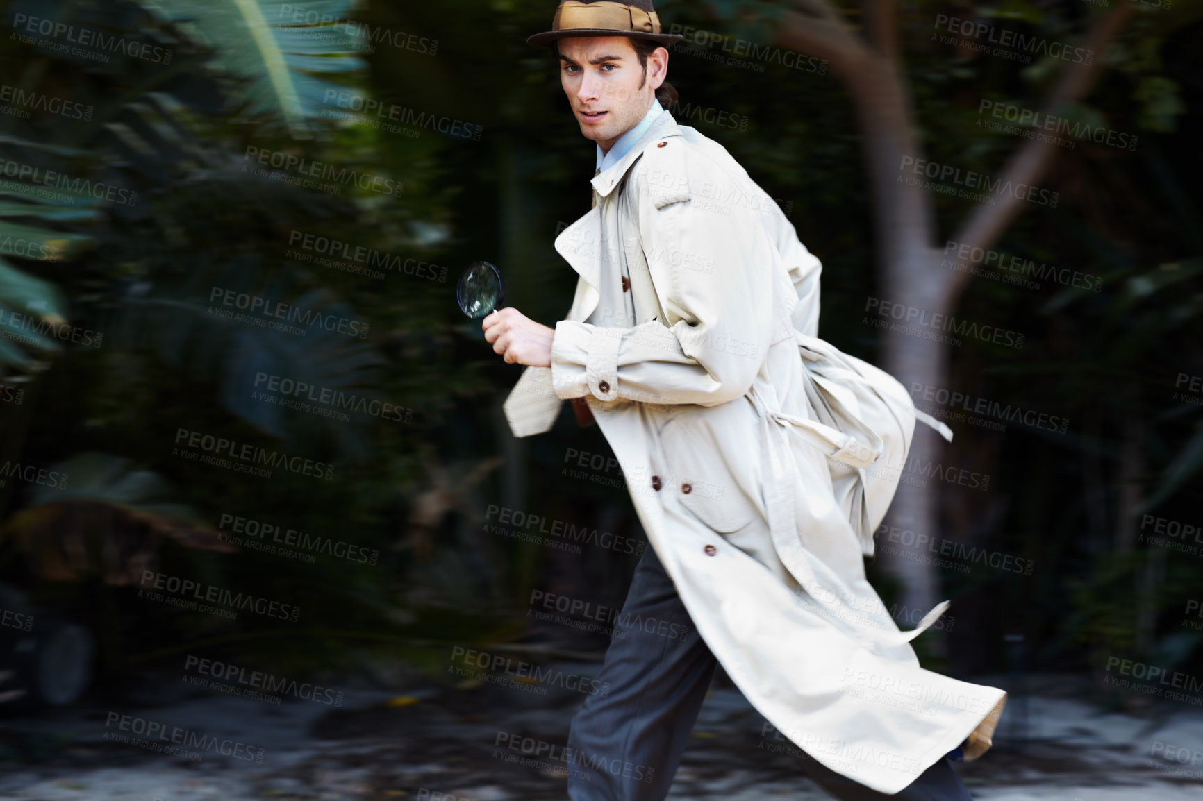 Buy stock photo Sneaky detective running away after snooping for clues