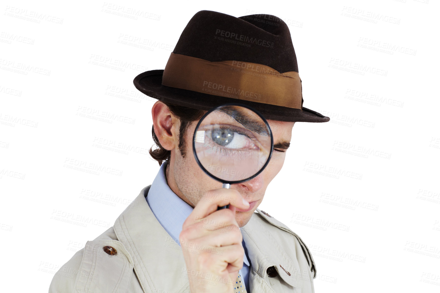 Buy stock photo Curious private investigator looking through a magnifying glass against a white background