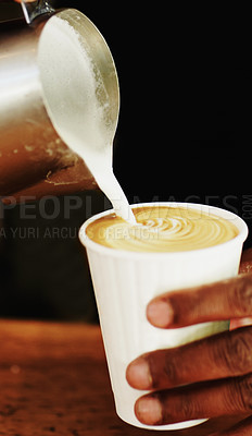 Buy stock photo Milk, coffee and hands of barista in cafe for cappuccino, restaurant and shopping. Retail, morning and espresso with closeup of man and pouring in cup for drink, latte art and preparation in store