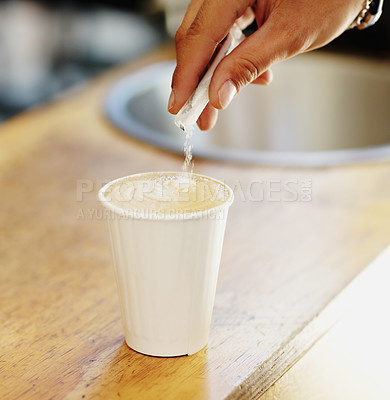 Buy stock photo Sugar, coffee and hands of person in cafe for cappuccino, restaurant and shopping. Retail, morning and espresso with closeup of man and pouring in cup for drink, latte art and preparation in store