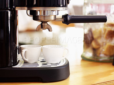 Buy stock photo Coffee, cups and machine on table in cafe for cappuccino, latte or hot drink. Restaurant, electrical appliance and caffeine mug for making or brewing espresso in retail shop or small business.