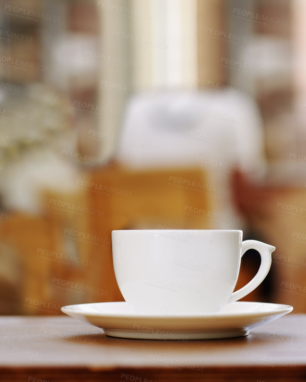 Buy stock photo Closeup of one coffee cup on table in a cafe, hot beverage and caffeine drink for breakfast or energy. Espresso, cappuccino and latte in hospitality industry with ceramic teacup and cacao liquid