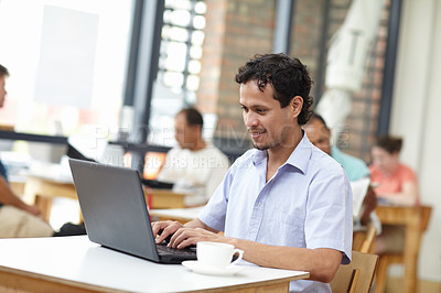 Buy stock photo Student man, laptop and coffee shop with smile, typing or search on internet for job opportunity. Young guy, computer and cafe for reading, happy and social network for news, research or video on web