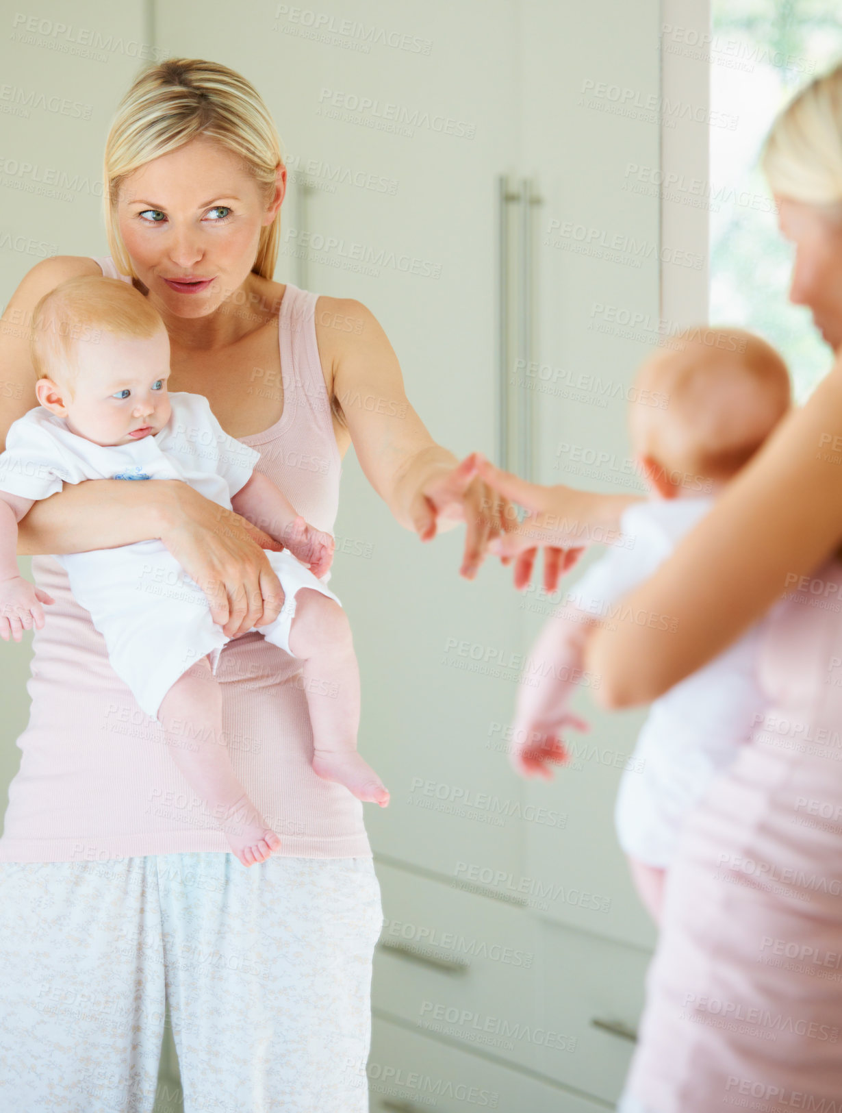 Buy stock photo Mother, baby and love in mirror, care and hug in reflection, home and learning for development. Mom, child and bonding or embrace, security and family or play, motherhood and creative education