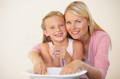 Buy stock photo Portrait, kitchen and baking mom, happy child or family parent help, support or teaching girl cooking recipe. Mothers love, happiness or young kid smile for learning how to bake with bowl ingredients