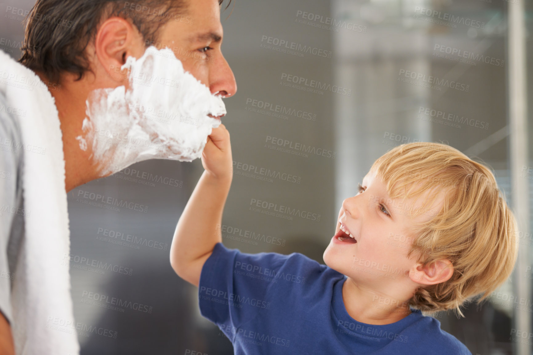 Buy stock photo Help with shaving, dad and child with cream on face, smile and bonding in home with morning routine. Teaching, learning and father with happy son in bathroom for shave, clean fun or grooming together