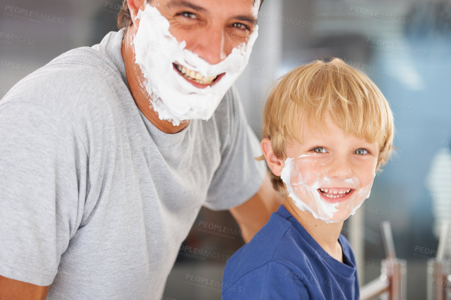 Buy stock photo Shaving, portrait of father and child with cream on face, smile and bonding in home with morning routine. Teaching, learning and dad with happy son in bathroom for shave, fun and grooming together.