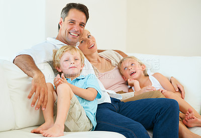 Buy stock photo Portrait of a loving family of four spending time together