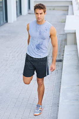 Buy stock photo Man, fitness and stretching legs for workout, exercise or outdoor training and cardio preparation. Handsome or active male person in warm up, leg stretch or getting ready for run, health and wellness