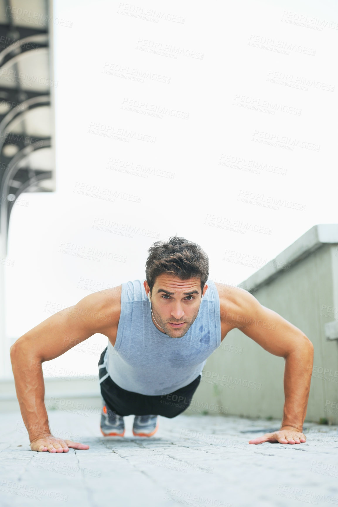 Buy stock photo Man, portrait and push ups in fitness for exercise, workout or outdoor training on floor. Muscular male person or athlete lifting body weight for strength, muscle or endurance in health and wellness