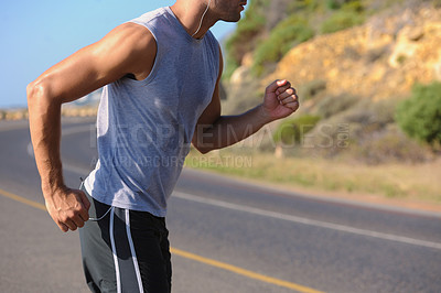 Buy stock photo Fitness, sweat and man athlete in mountain running for race, marathon or competition training. Sports, workout and body of male runner doing a cardio exercise for health or wellness in outdoor nature