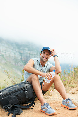 Buy stock photo Portrait, hiking and happy with man in nature for health, trekking and adventure. Travel, explore and journey with person and water in mountain path for backpacking, relax and wellness vacation
