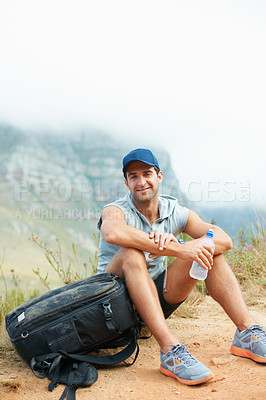 Buy stock photo Break, man or portrait in nature hiking with water, backpack or drink in workout, training or exercise mockup. Happy, smile or relax person on mountains trail health, wellness or summer sports rest