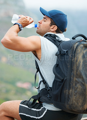 Buy stock photo Man, hiking and drinking water in nature rest for fitness, exercise and workout in Brazil mountains. Hiker, athlete and person with liquid bottle for summer sports break, electrolytes and wellness