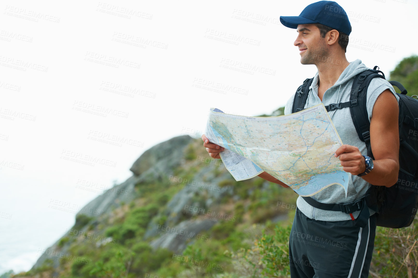 Buy stock photo Man, hiking and map for direction, smile and guide on trail, fitness and exercise on holiday. Male person, lost and documents for information, travel and journey or adventure to nature for cardio