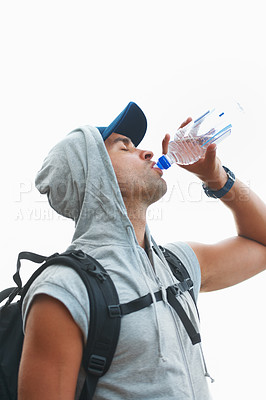 Buy stock photo Person, hiking and drinking water in nature rest for fitness, exercise and workout in Brazil mockup space. Hiker, athlete and man with liquid bottle for summer sports break, electrolytes and wellness