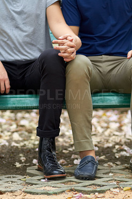 Buy stock photo Cropped view of a homosexual couple holding hands