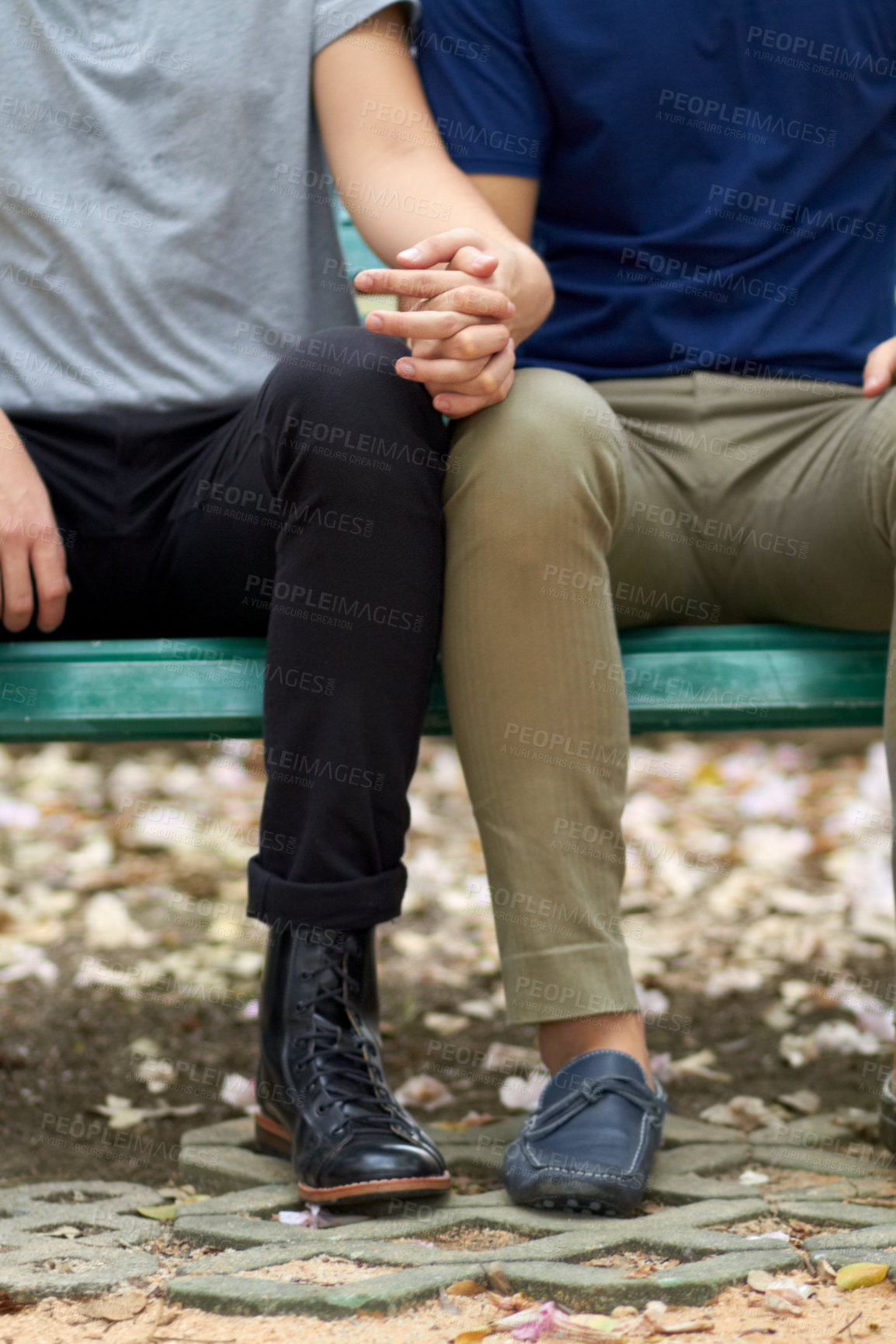 Buy stock photo Cropped view of a homosexual couple holding hands