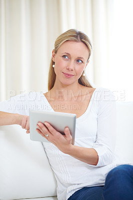 Buy stock photo Mature woman, tablet and thinking in home, serious face and living room couch. Social media, technology and communication for scrolling, vision and idea with connection, streaming and contemplating
