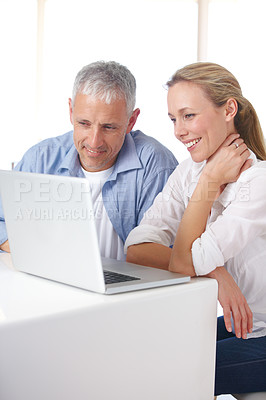 Buy stock photo Mature couple, laptop and video call with smile, conversation and living room couch. Social media, technology and communication with family, man and woman with connection, streaming and happy
