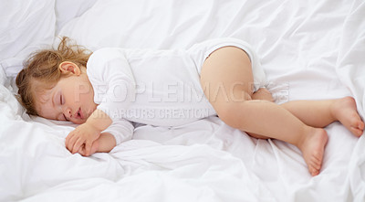 Buy stock photo Baby, kid and sleeping on bed for calm break, peace and dream to relax at home from above. Tired, cozy or young child asleep for newborn development, healthy childhood growth and rest in nursery room