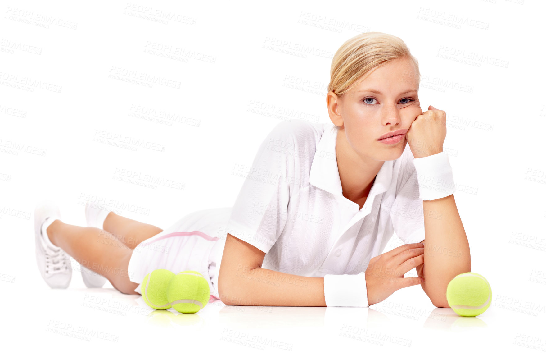 Buy stock photo Portrait, ball and a bored woman or tennis player in studio isolated on white background for sports or fitness. Exercise, workout and training with a tired or exhausted athlete lying on the ground