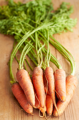 Buy stock photo Carrots on a countertop