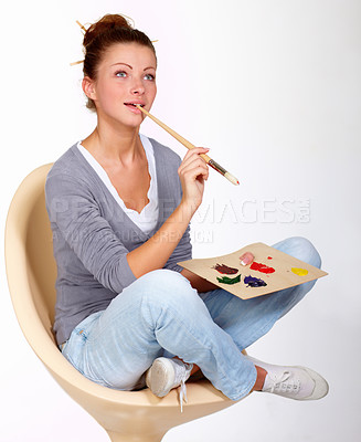 Buy stock photo Thinking, painting and art ideas in studio for creativity, talent and a paint brush for color. Female artist or painter person isolated on a white background for creative work or project to relax