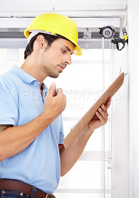 Buy stock photo Technician, checklist and home security camera for CCTV installation, documents and reading safety insurance. Man thinking or engineering with clipboard for surveillance information and services