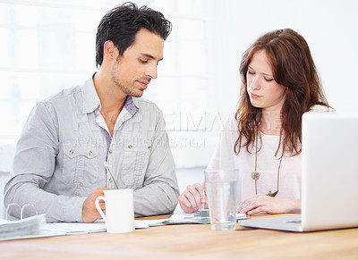 Buy stock photo Documents, review and business woman with partner in meeting collaboration, teamwork and financial planning. Startup employees or people with paperwork, feedback or advice on finance, taxes or profit