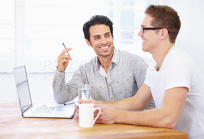 Buy stock photo Computer, meeting and business man with partner for happy teamwork, collaboration and planning, ideas and project. People or employees talking of website design, laptop or software support in office