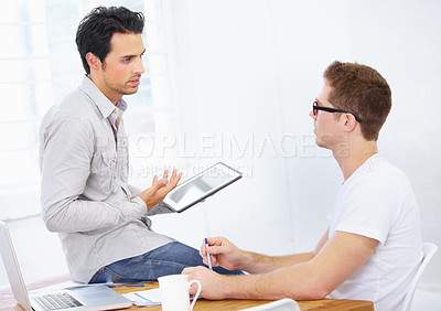 Buy stock photo Designer, business men and tablet for discussion, planning project or collaboration for online app at desk in office. Creative teamwork, digital technology or conversation of advice in startup agency