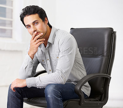Buy stock photo Portrait, business or man on chair in office thinking with pride for career, job or work. Professional, male entrepreneur and serious decision or employee, ceo or person sitting in startup workplace