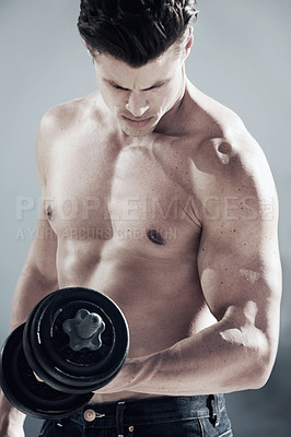 Buy stock photo Sports, muscular and man with dumbbell weight in a studio for bodybuilding workout, exercise or training. Fitness, health and young male athlete from Canada with equipment isolated by gray background